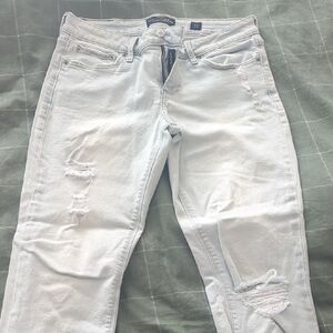 Women's Light Blue Distressed Jeans